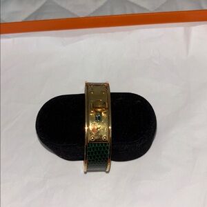 Hermes Gold and Green Wearable wrist bangle